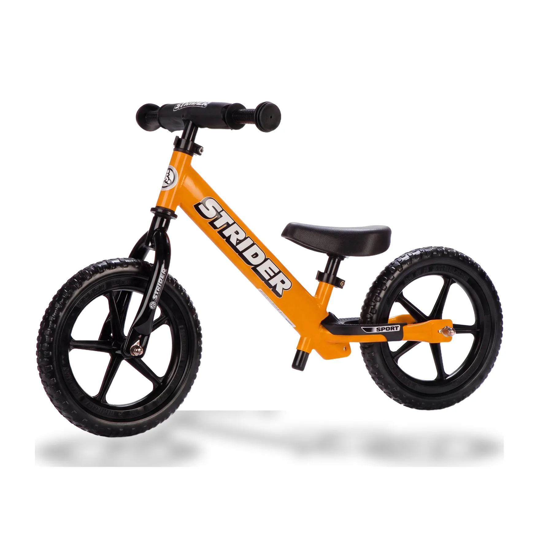 Strider 12 Sport balance bike in orange on white background