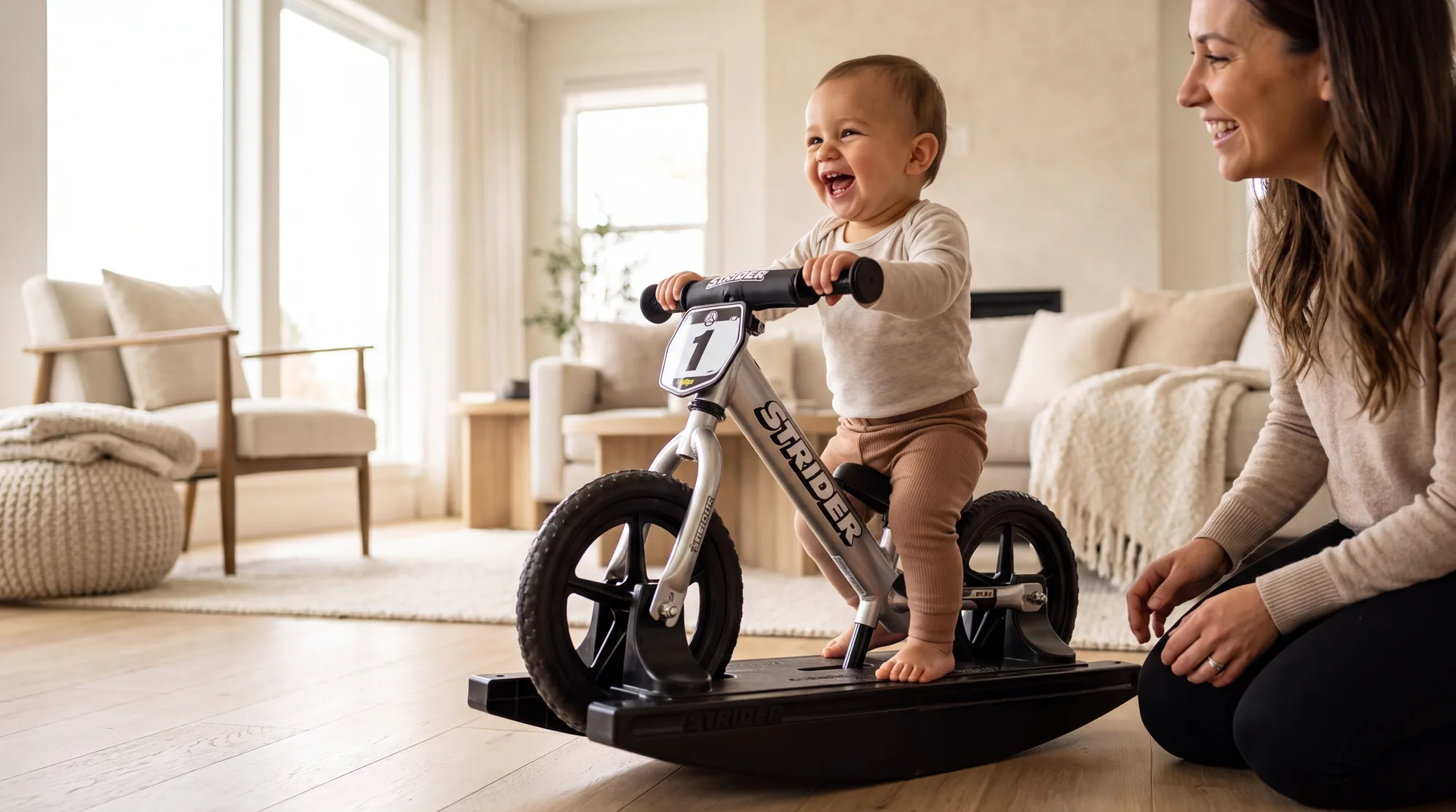 Baby rocking on a Strider Pro 2-in-1 Rocking Bike at home
